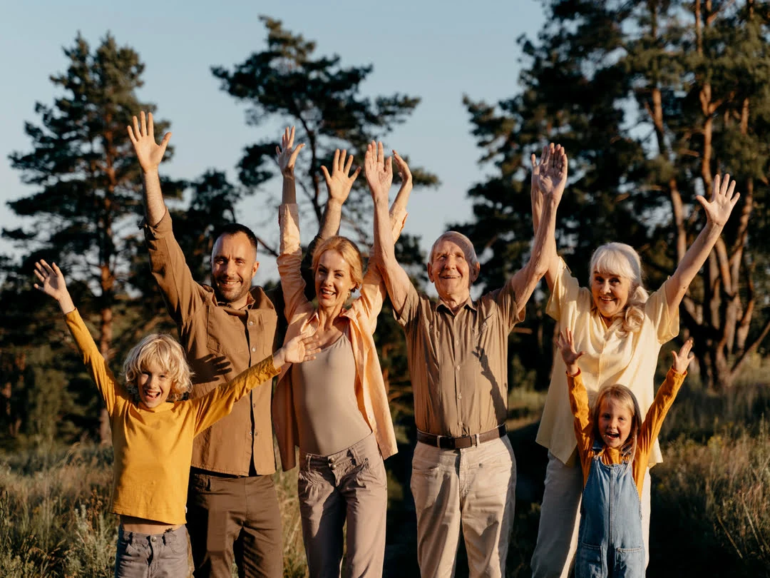 medium-shot-family-with-hands-up